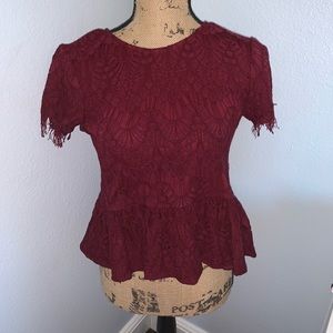 A maroon dress top
